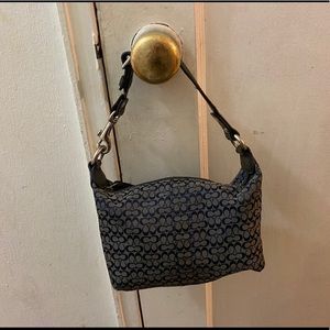 navy blue Coach handbag